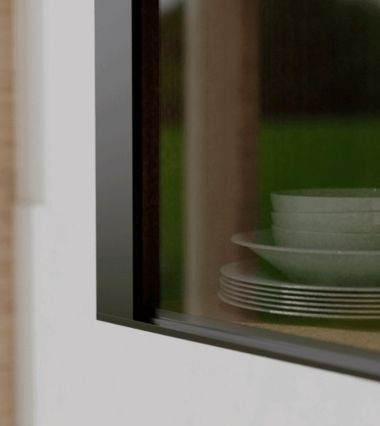 Image of a vitrine door showing the detailed profile of the frame.